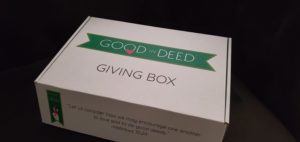 Donation Drive for Giving Bags and Giving Boxes Close Up of a White Box with Good In Deed Branding on it