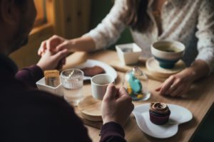 Beam App for Charity Two People Having a Meal at a Restaurant